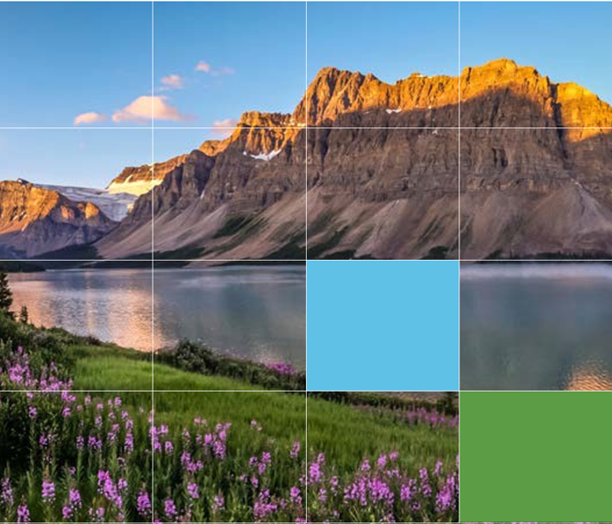 Scenic mountain and lake view with grid overlay and two coloured squares in lower sections.