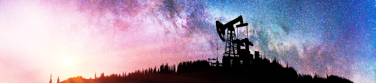 Oil derrick in front of the Milky Way