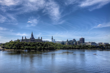 A distant view of Parliament from the Ottawa River