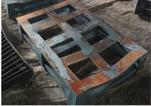 Figure 6 – Steel pallet used to support welded elbows in the furnace
